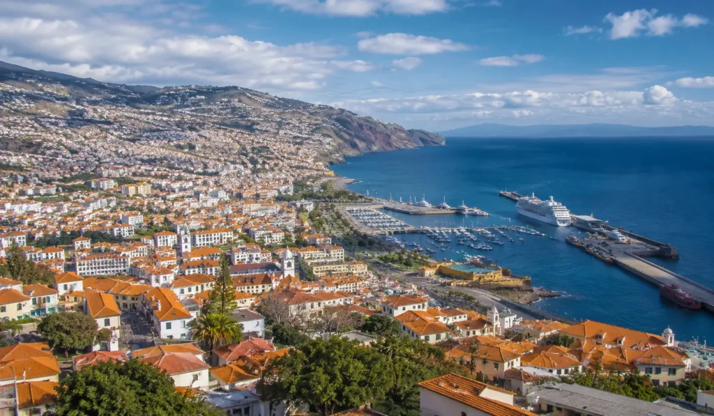 Funchal harbour and old town rooftops seen from above, Madeira Portugal