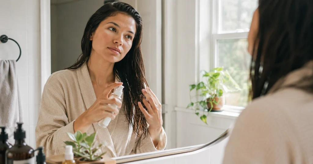 hair care routine application of conditioner in natural morning light