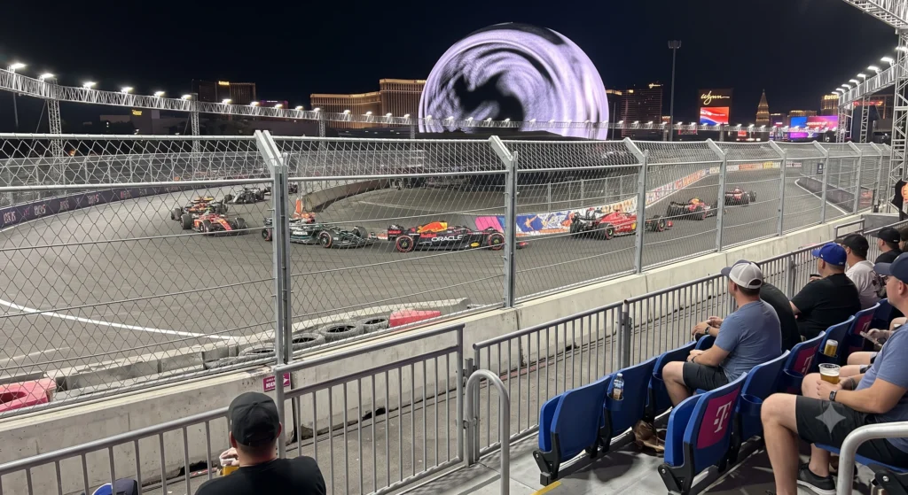 Las Vegas F1 Grand Prix Guide: What to Know Before Booking (2026) 232 View from the Sphere grandstand seating area overlooking the Las Vegas F1 track and turn.