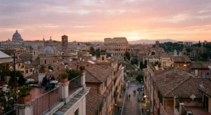 Historic Rome at sunrise with the Colosseum and surrounding city streets.