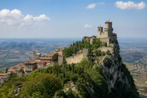 Guaita Tower and the medieval historic centre of San Marino overlooking the surrounding Italian countryside.
