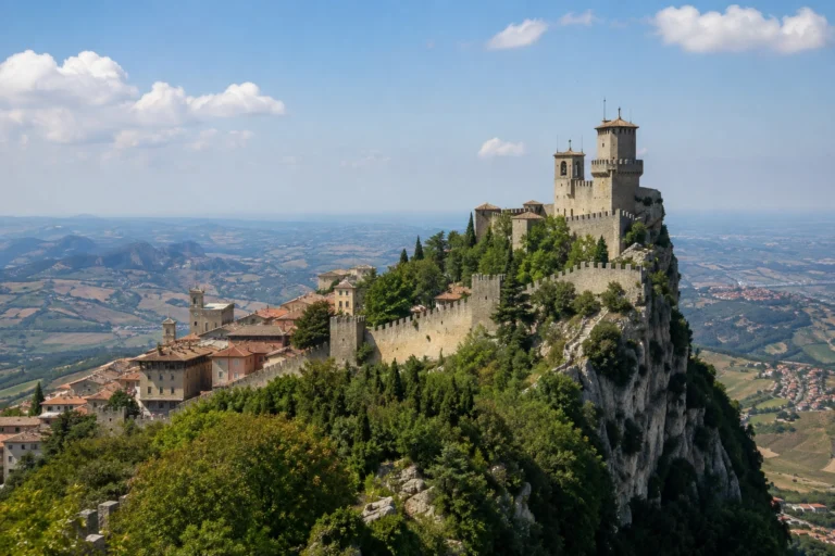 Guaita Tower and the medieval historic centre of San Marino overlooking the surrounding Italian countryside.